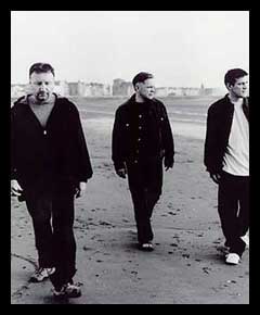 New Order with Peter Hook (left) - They enjoyed their 'Dawn' chorus
